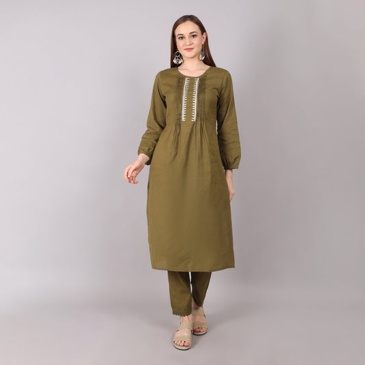 Stylish and comfortable organic cotton kurta set in mud green, ideal for a relaxed yet refined look.