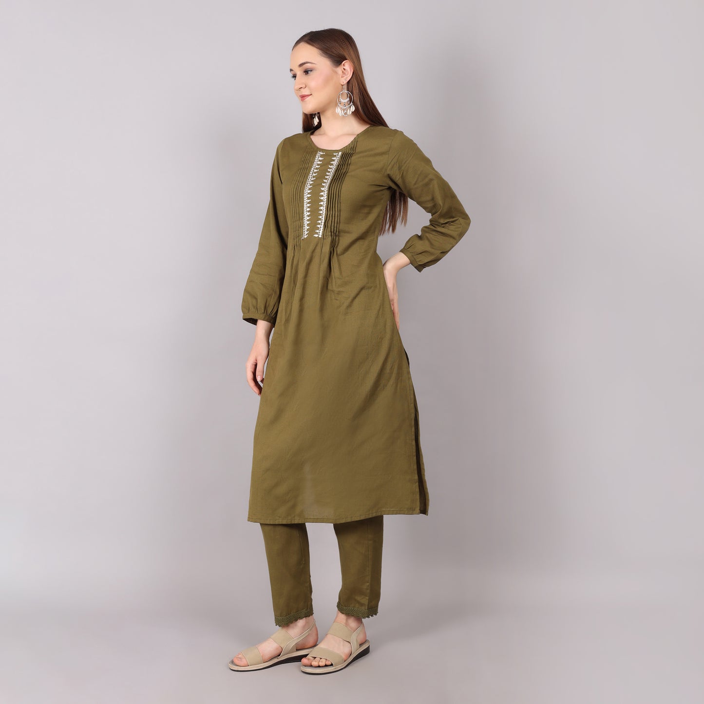 Graceful mud green kurta set in soft organic cotton, perfect for casual and festive occasions.
