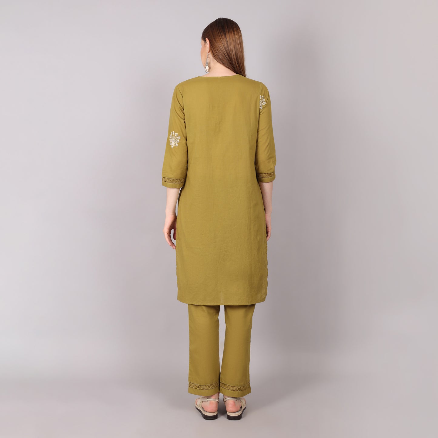 Lightweight and fashionable floral embroidered pure cotton kurta set with pleats, beads, and stone details for a timeless ethnic appeal.