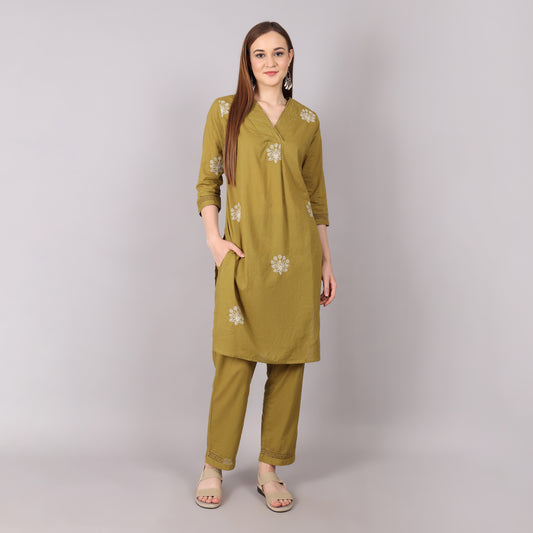Trendy pure cotton kurta set featuring intricate floral embroidery, pleated design, and dazzling bead and stone embellishments.