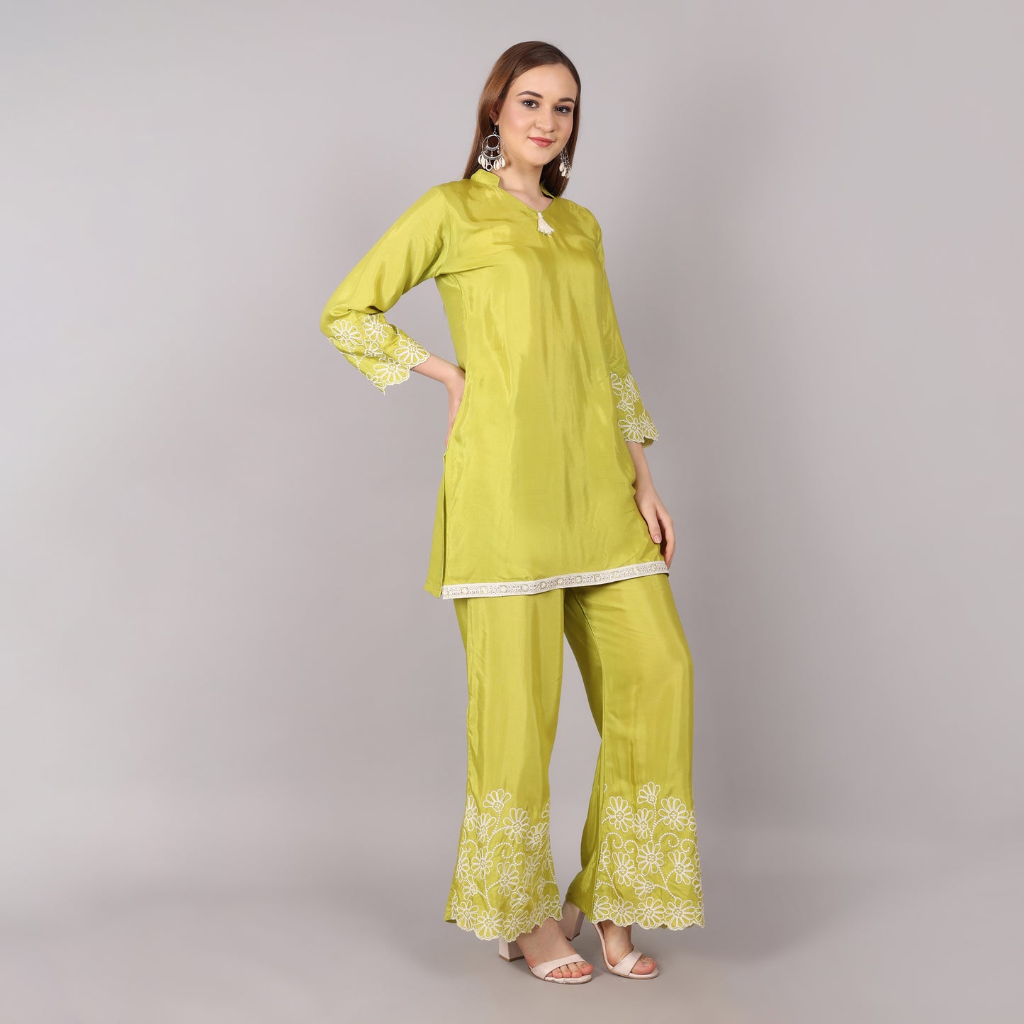 Chic lime green co-ord set with fine thread embroidery, blending modern fashion with traditional elegance.