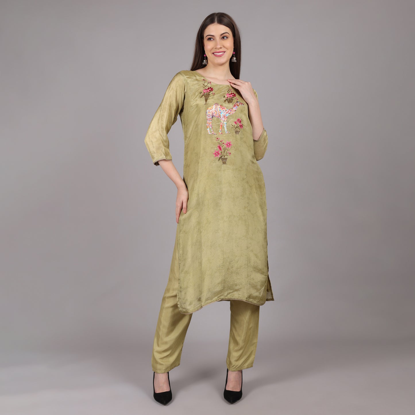 Lightweight and breathable green soft tissue silk kurta set, offering comfort with regal elegance.
