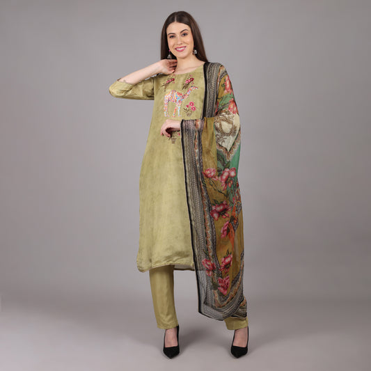 Graceful green soft tissue silk kurta set blending traditional charm with modern sophistication.