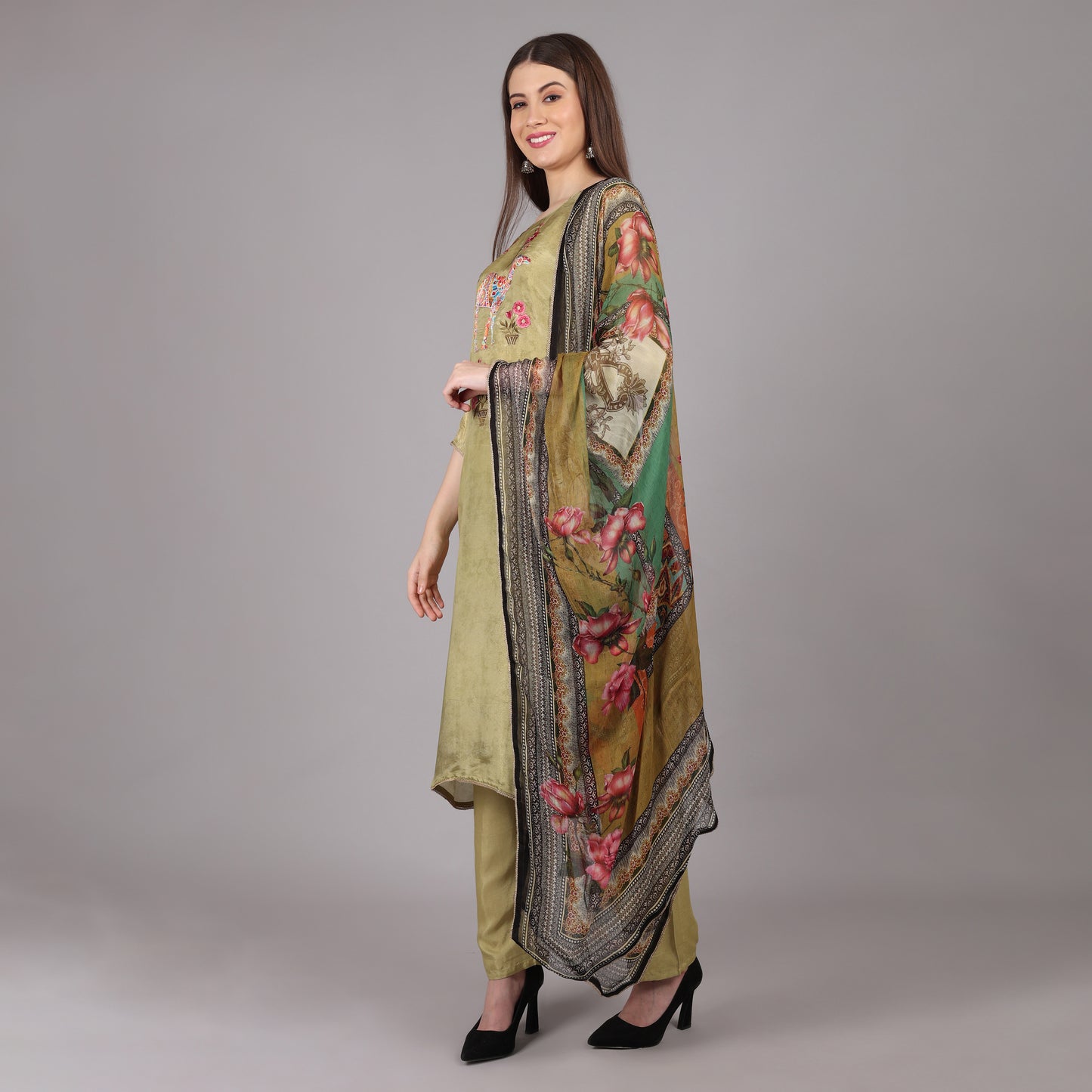 Chic and stylish green tissue silk kurta set, perfect for festive and formal occasions.