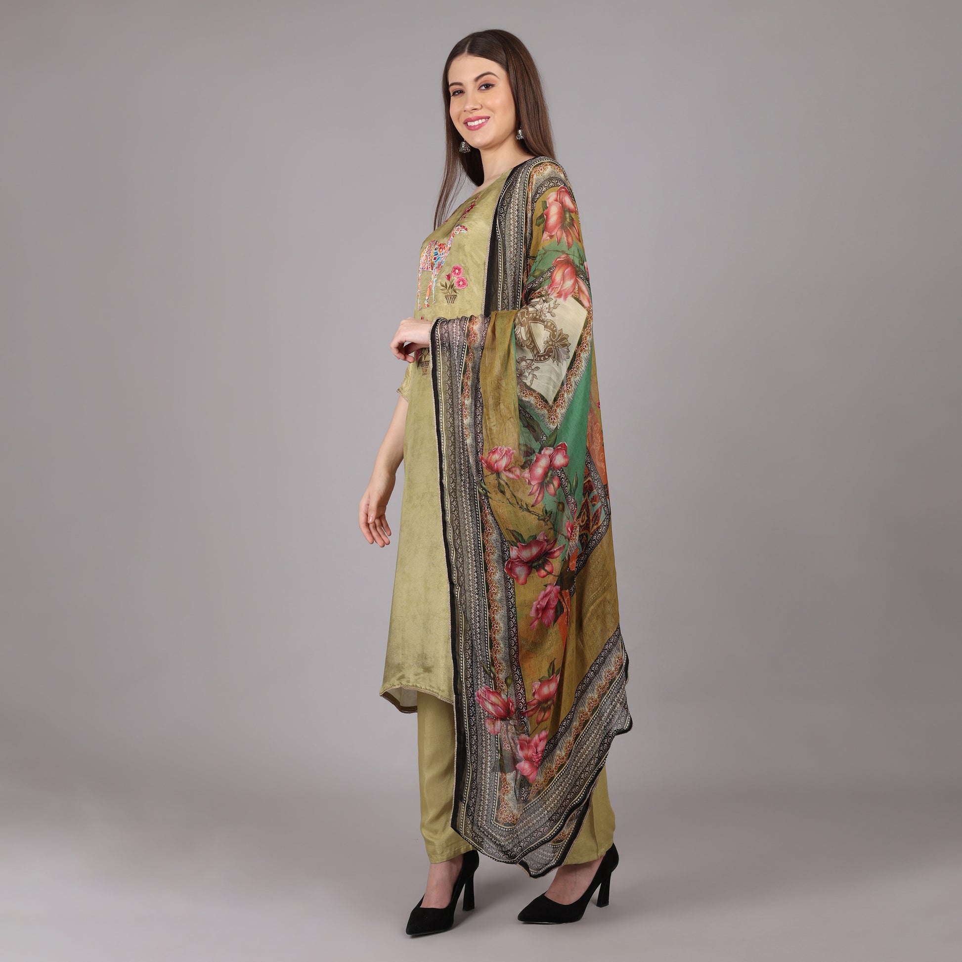 Chic and stylish green tissue silk kurta set, perfect for festive and formal occasions.