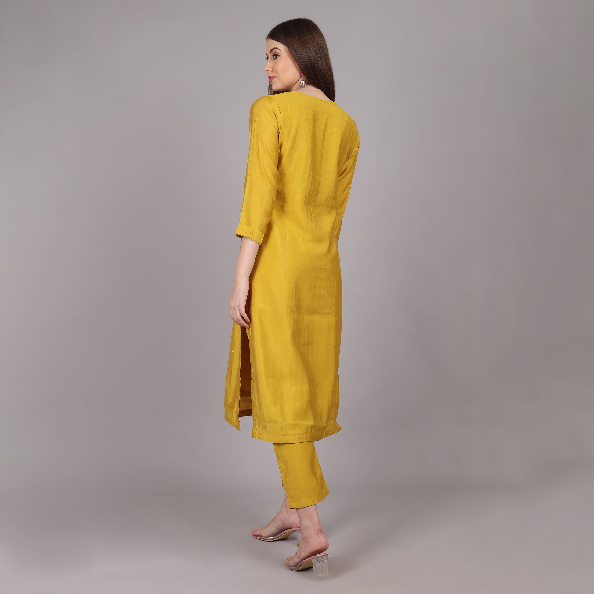 Lightweight and breathable yellow Dola silk kurta set, offering effortless style and sophistication.