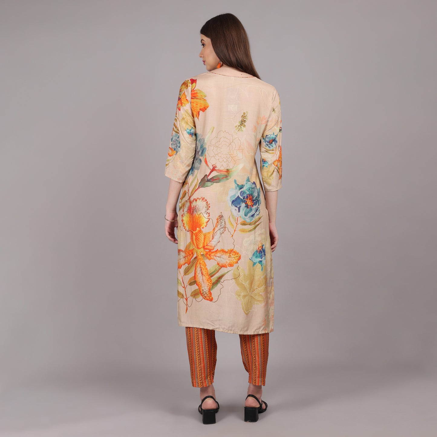 Trendy pure crepe kurta set with fine hand embroidery, ideal for festive and formal occasions.