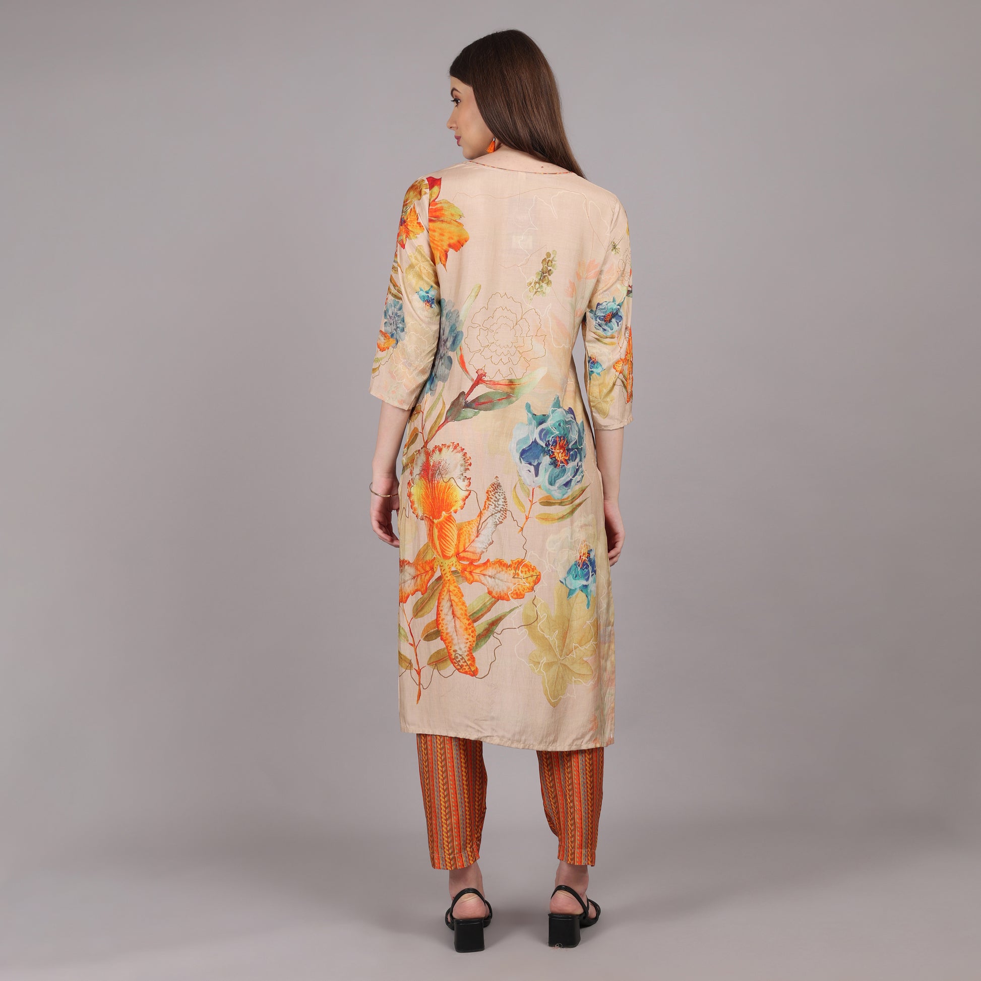 Trendy pure crepe kurta set with fine hand embroidery, ideal for festive and formal occasions.