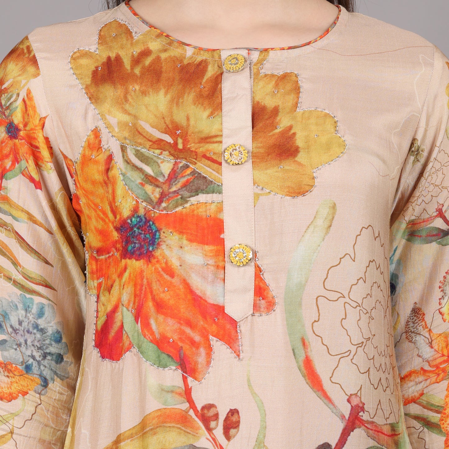 Chic and stylish pure crepe kurta set featuring delicate handcrafted embroidery.