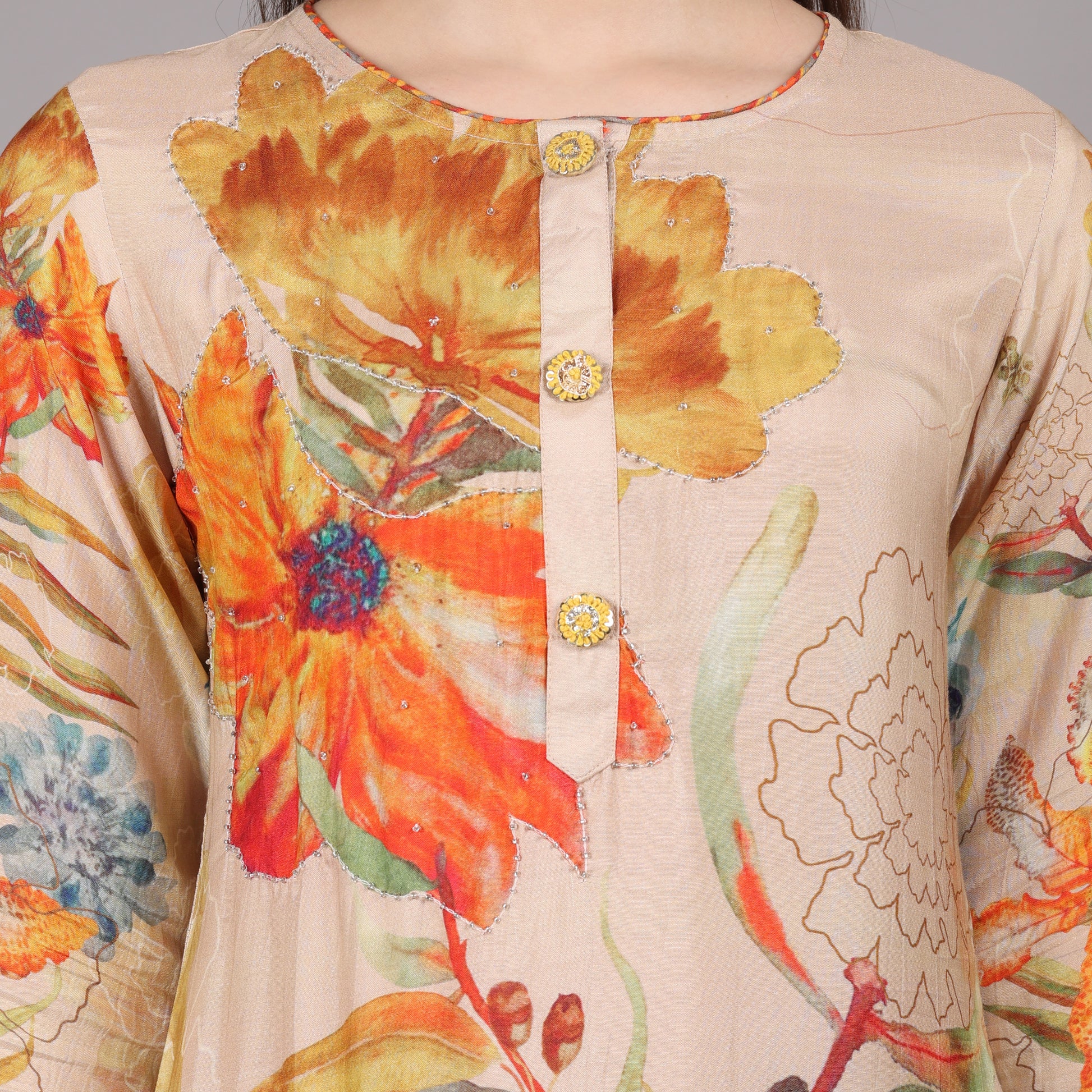 Chic and stylish pure crepe kurta set featuring delicate handcrafted embroidery.