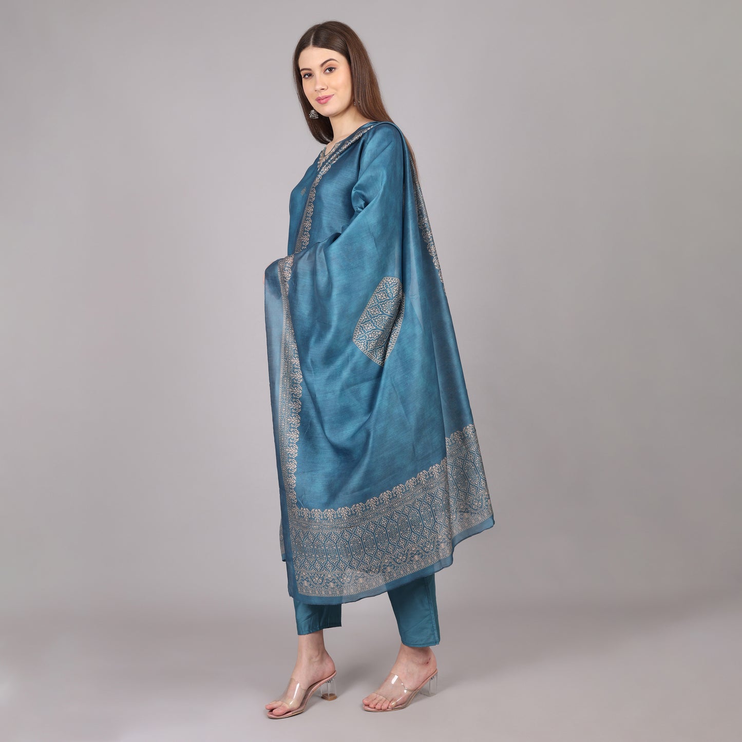 Elegant powder blue Chanderi silk kurta set featuring a luxurious sheen and intricate detailing.