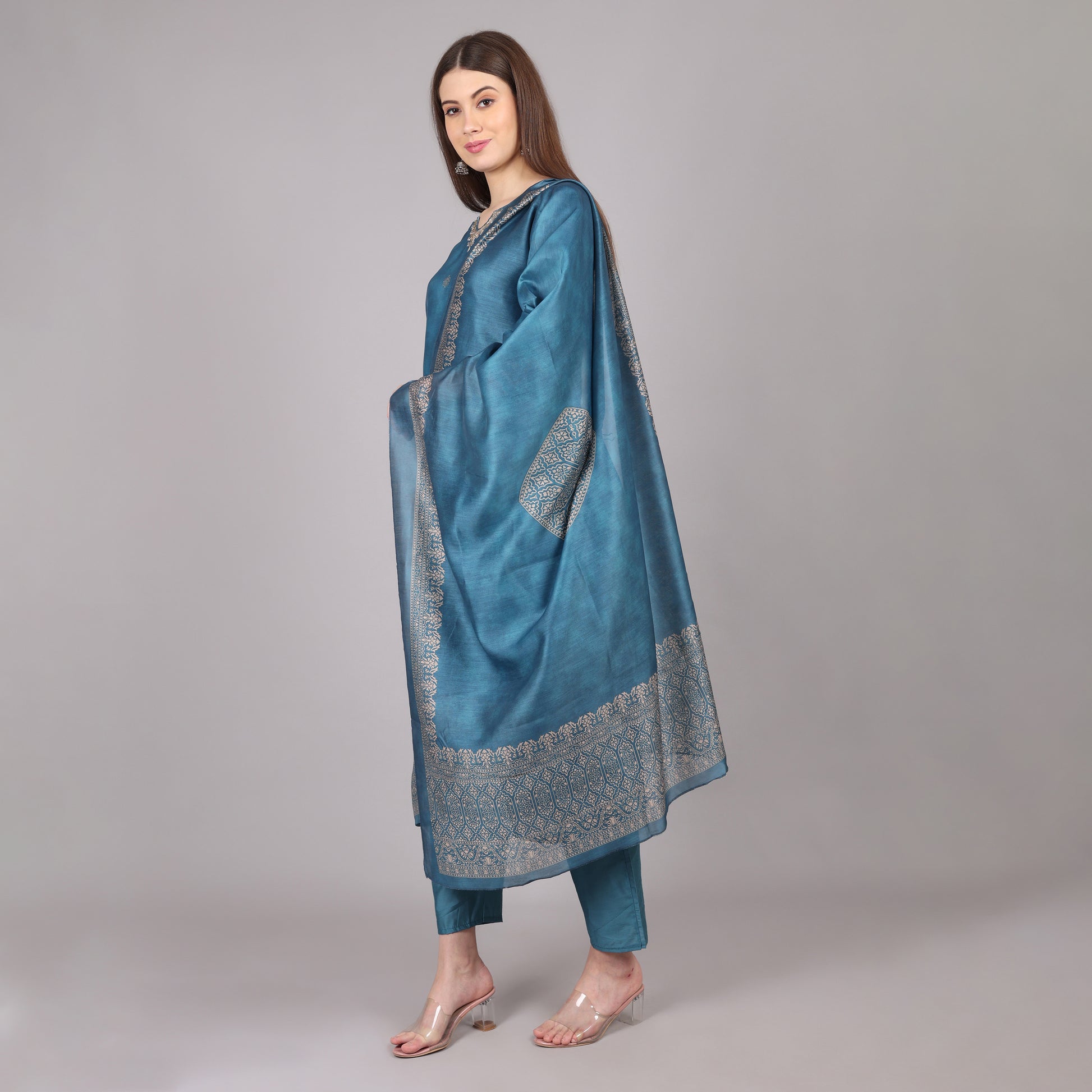 Elegant powder blue Chanderi silk kurta set featuring a luxurious sheen and intricate detailing.