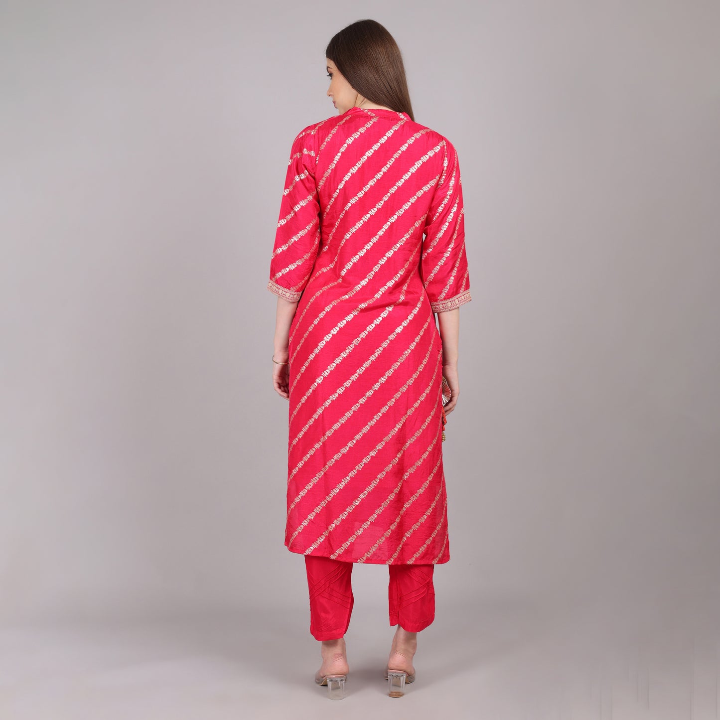 Lightweight and breathable hot pink Dola silk kurta set, offering effortless style and sophistication.