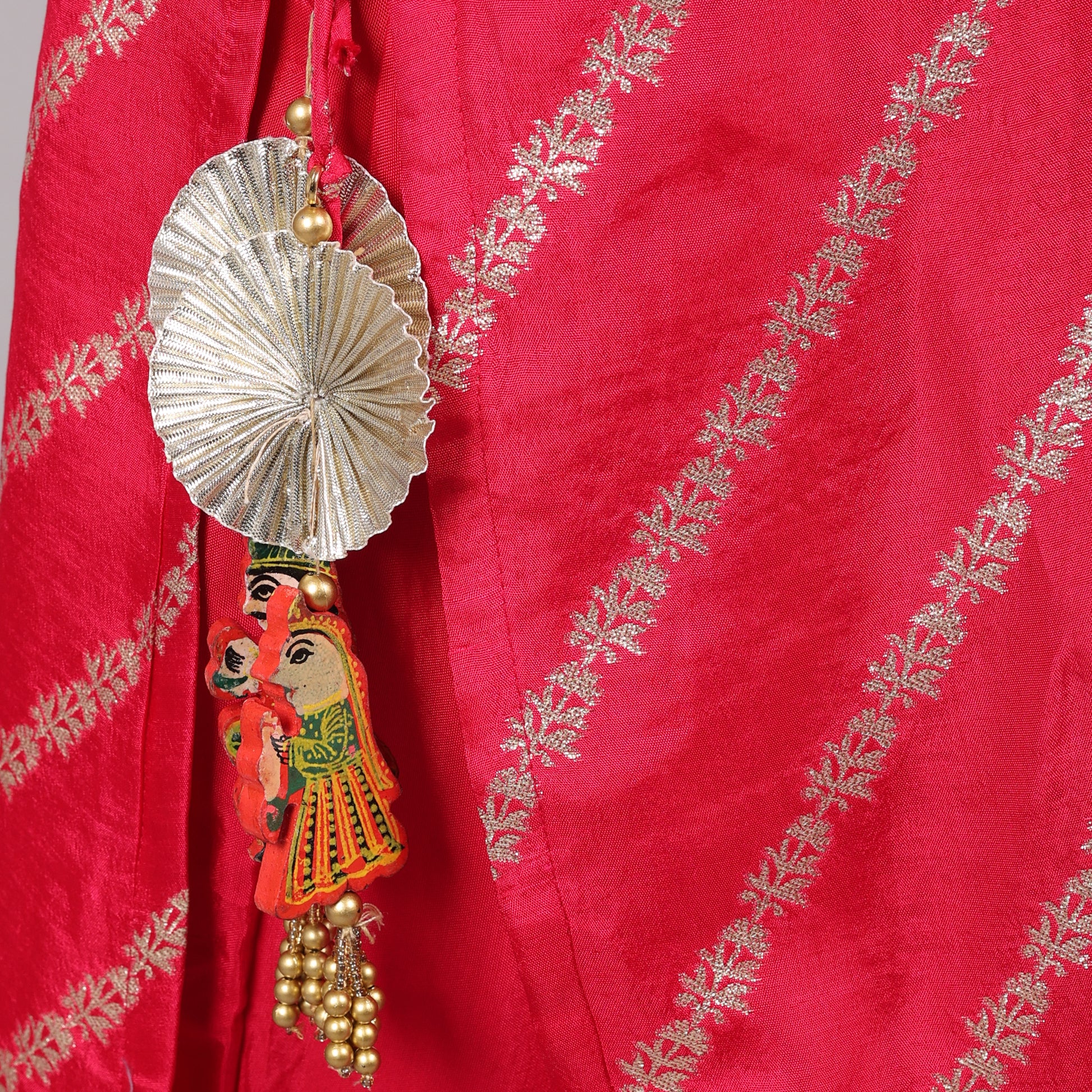 Sophisticated hot pink kurta set crafted from premium Dola silk for a luxurious ethnic look.