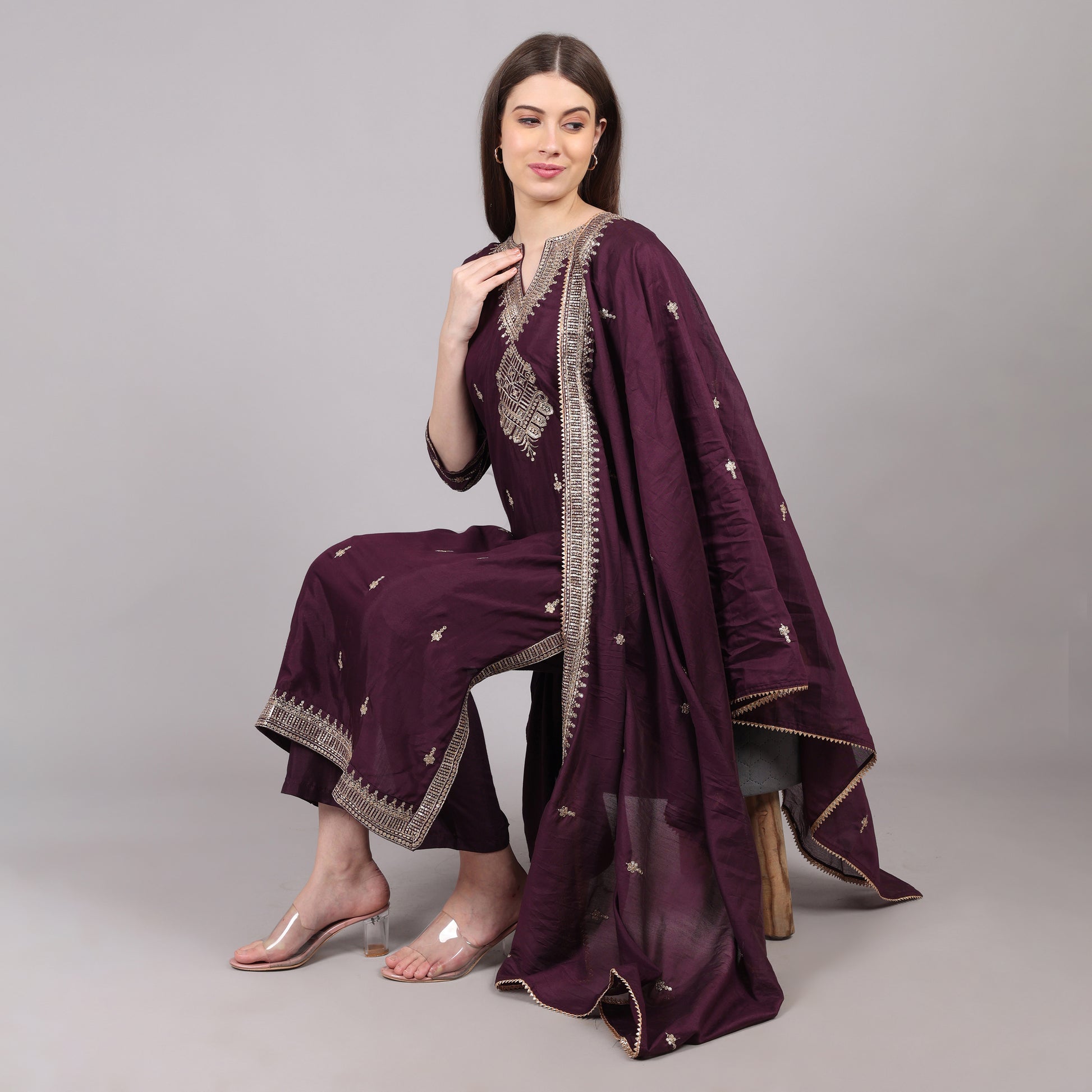 Lightweight and breathable wine silk embroidered kurta set, offering comfort with sophistication.
