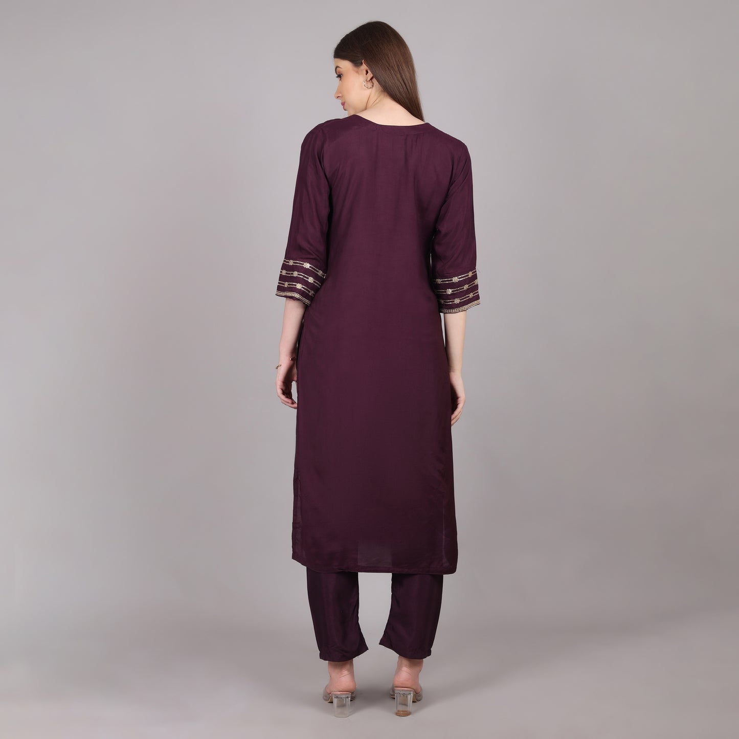 Trendy wine silk kurta set adorned with delicate embroidery, ideal for weddings and celebrations.