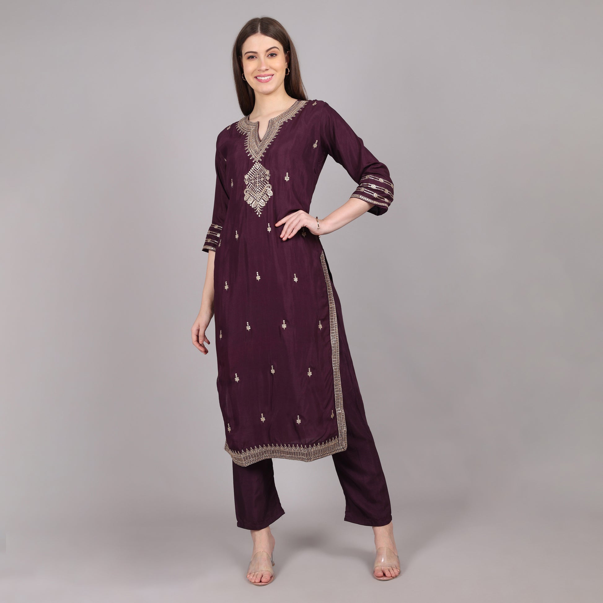 Graceful wine silk embroidered kurta set blending luxury with timeless ethnic charm.