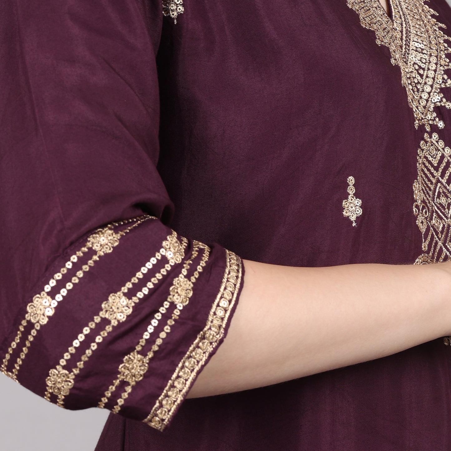 Elegant wine silk embroidered kurta set featuring intricate detailing for a regal look.