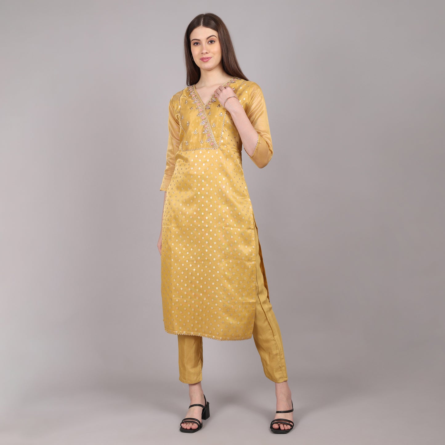 Trendy golden tissue kurta set with a rich texture, ideal for special celebrations.