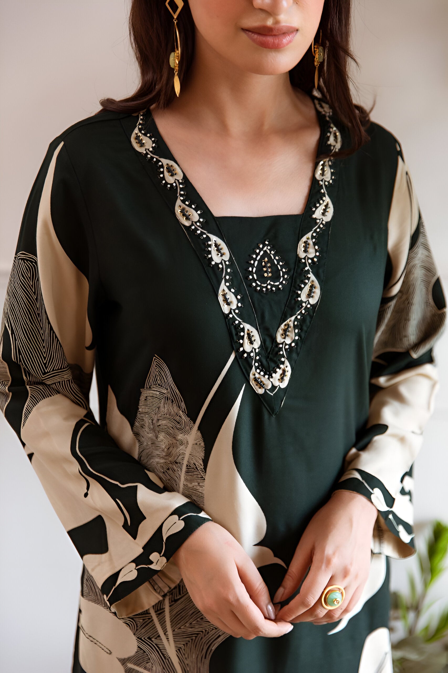 Sophisticated bottle green kurta set with a timeless A-line cut, offering a refined and graceful appeal.