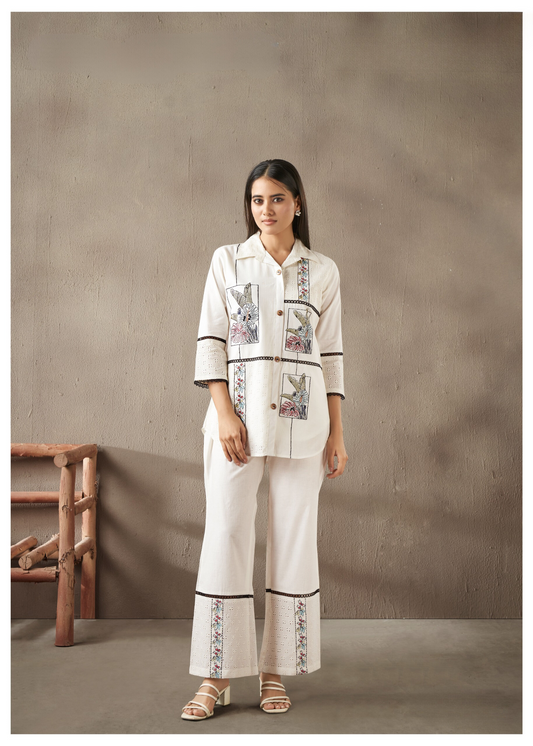 Graceful off-white co-ord set adorned with exquisite Schiffli embroidery, ideal for an effortless yet refined appearance.
