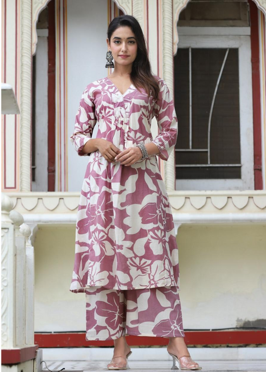 Chic and breezy floral printed kurta set in purple, featuring a classic design with coordinated palazzos.