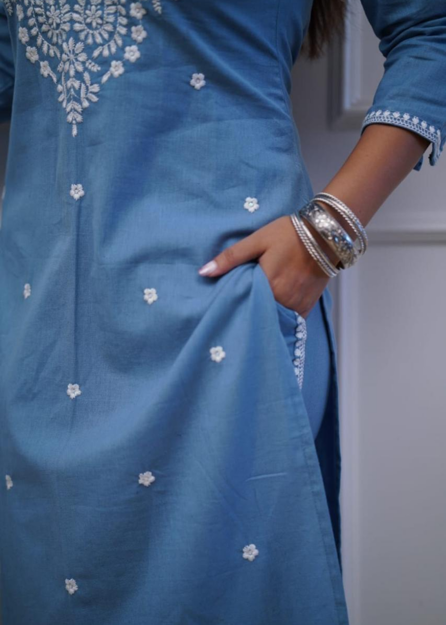 A soft and breathable cotton kurta set featuring delicate embroidery, perfect for a stylish yet comfortable look.
