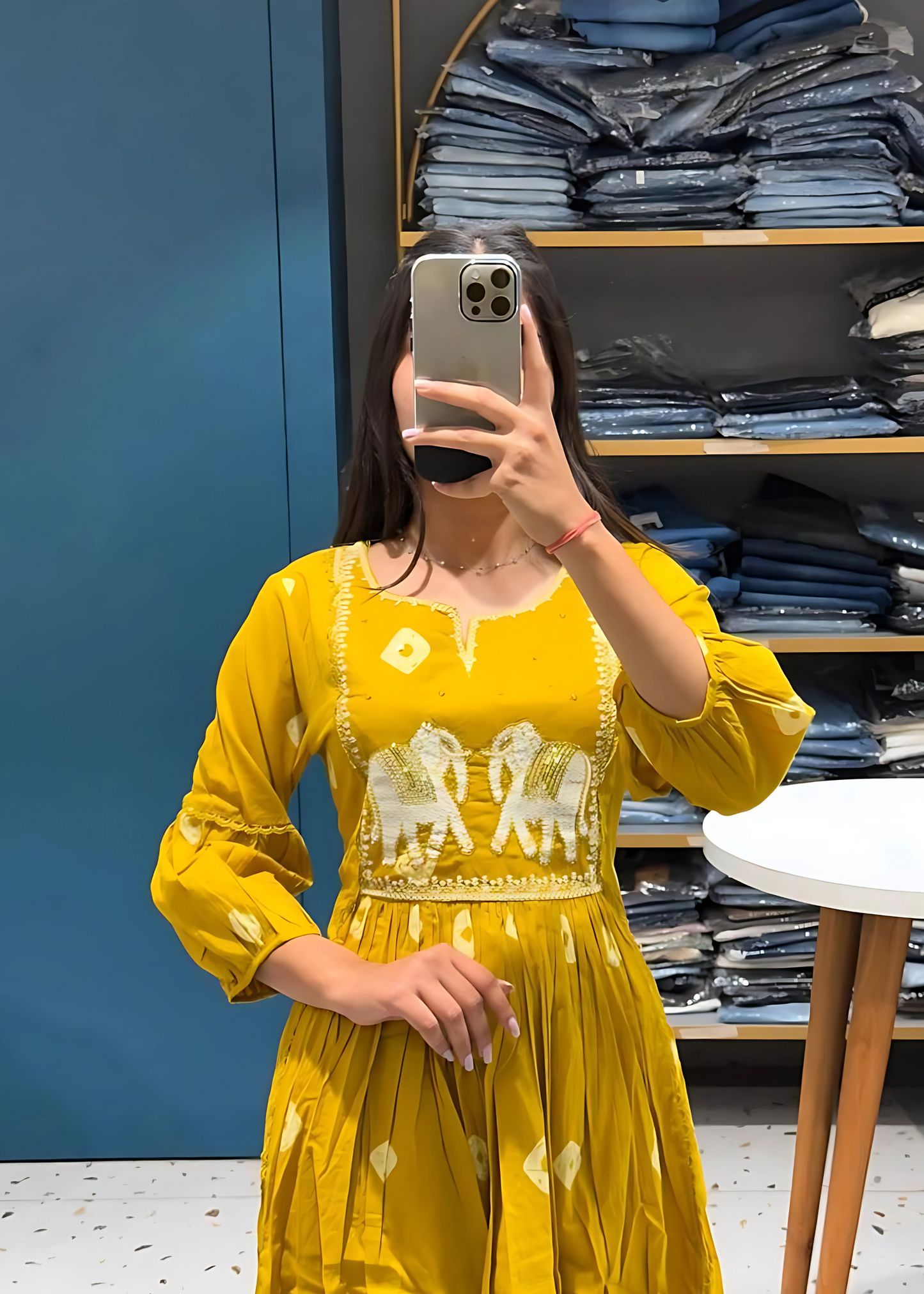 Elegant yellow kurta and pant set featuring intricate elephant embroidery, paired with a matching dupatta for a graceful ethnic look.