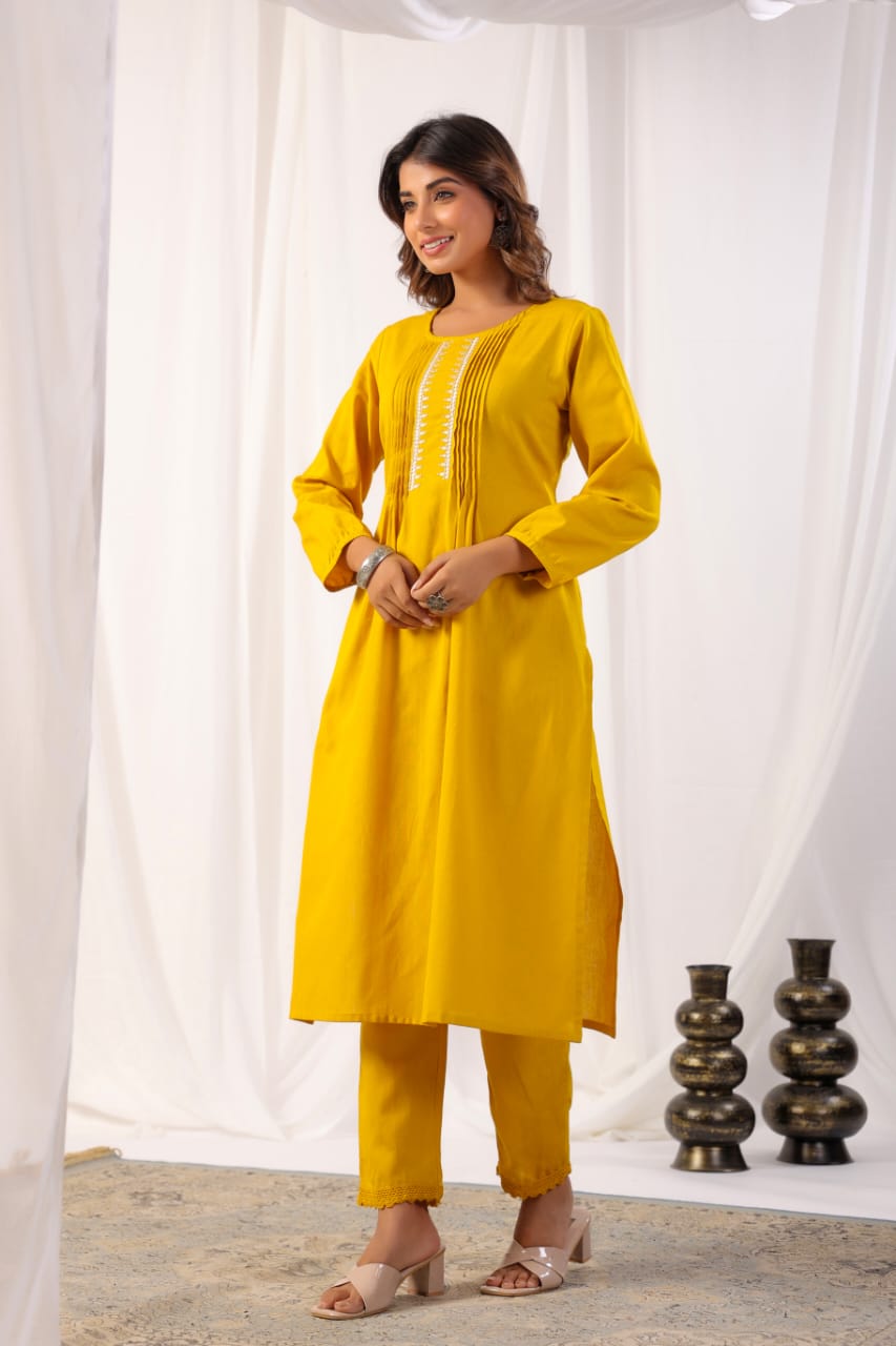 Elegant yellow organic cotton set designed for comfort and style, perfect for a sustainable and breathable ethnic look.