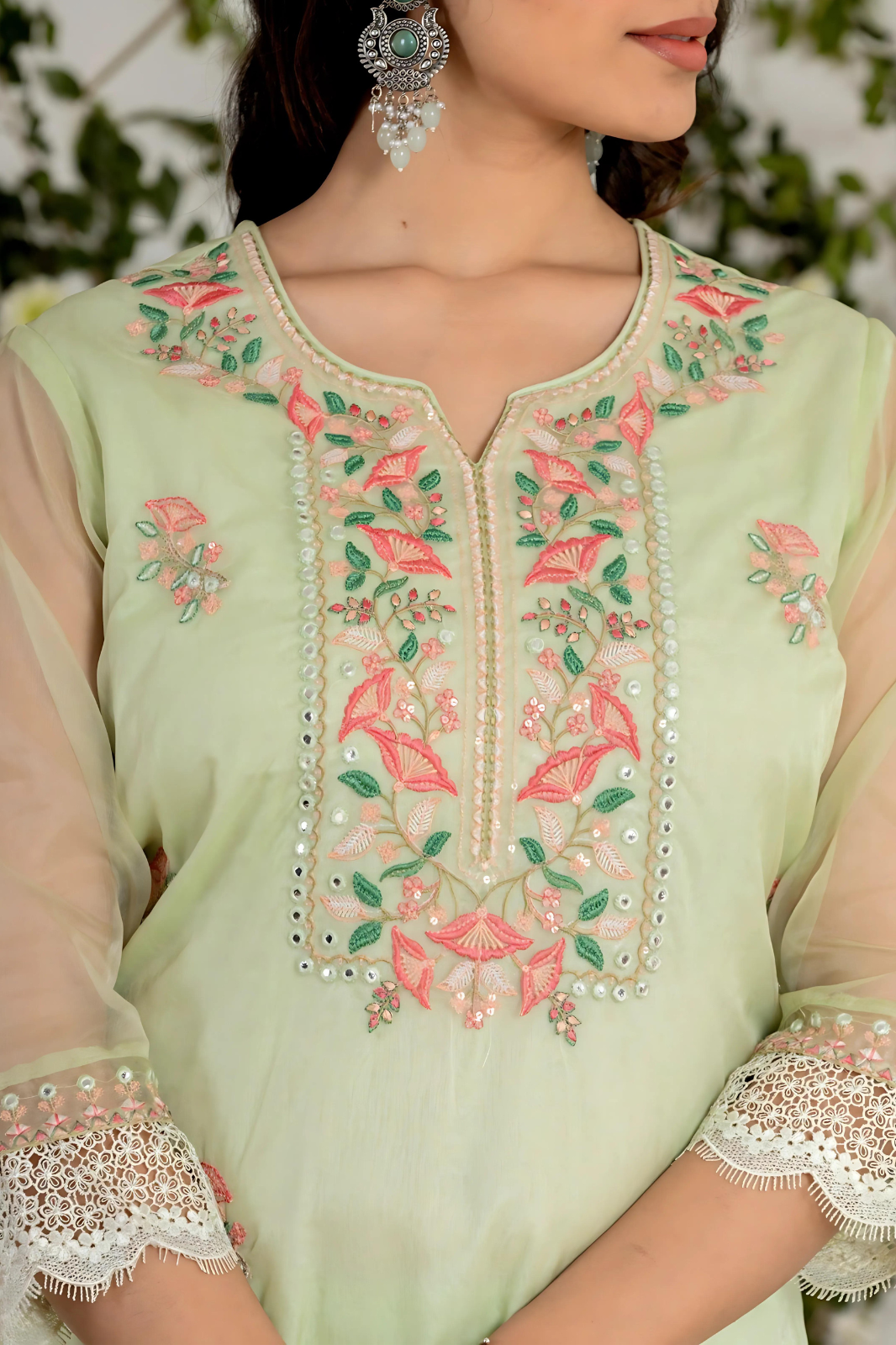 Premium green organza suit set designed with a modern touch, perfect for weddings and celebrations.