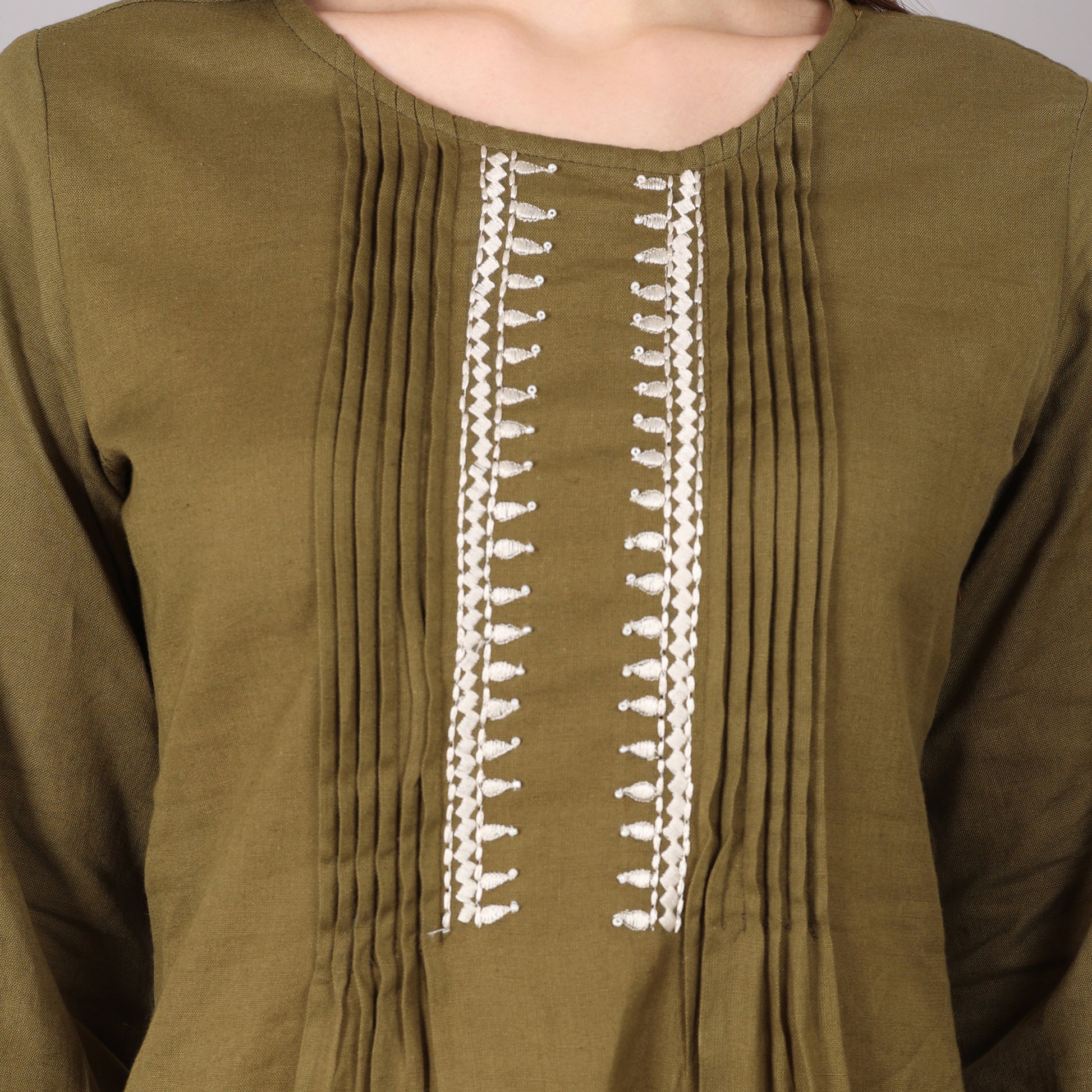 Chic and breathable mud green kurta set crafted from organic cotton for all-day comfort.