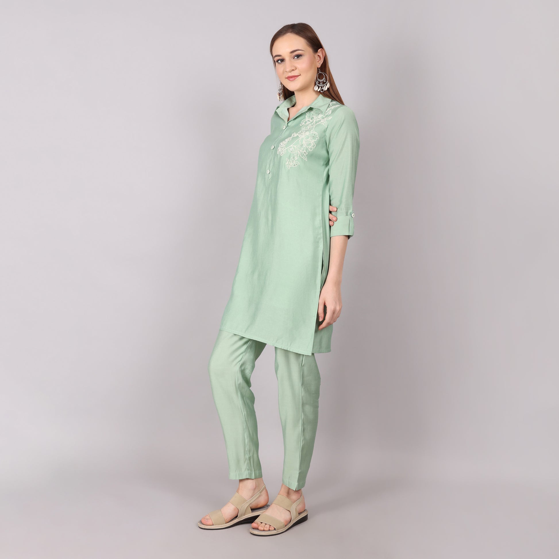 Chic ice green co-ord set designed with a sleek silhouette for a refined and polished look.

