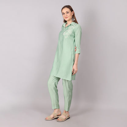 Chic ice green co-ord set designed with a sleek silhouette for a refined and polished look.
