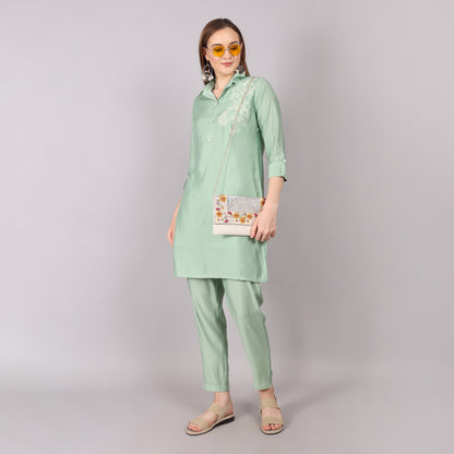 Elegant ice green co-ord set featuring a chic and sophisticated design for a stylish look.