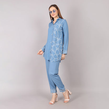 Elegant sky blue embroidered co-ord set featuring intricate detailing for a refined and stylish look.