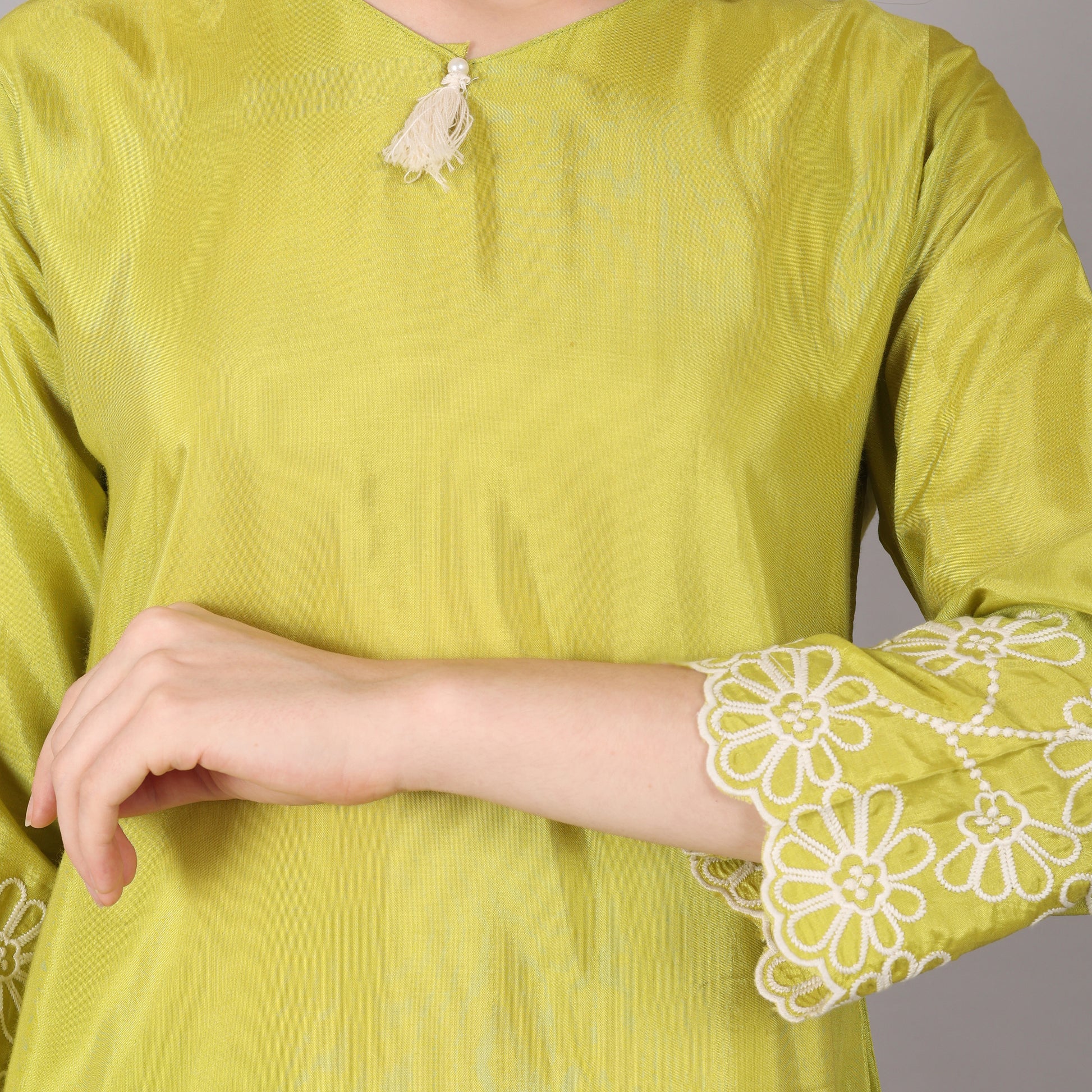 Stylish lime green embroidered co-ord set featuring delicate threadwork for a trendy and graceful appeal.