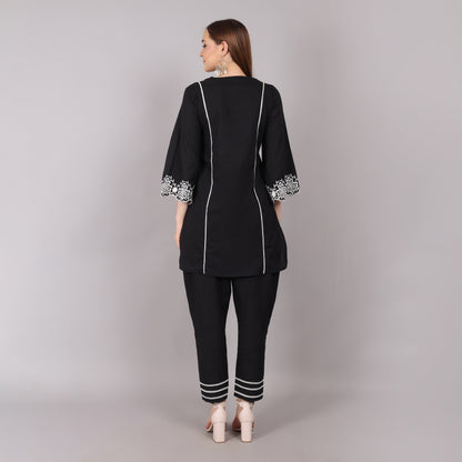 Fashionable and versatile dreamy black co-ord set in cotton, offering a relaxed yet refined look.