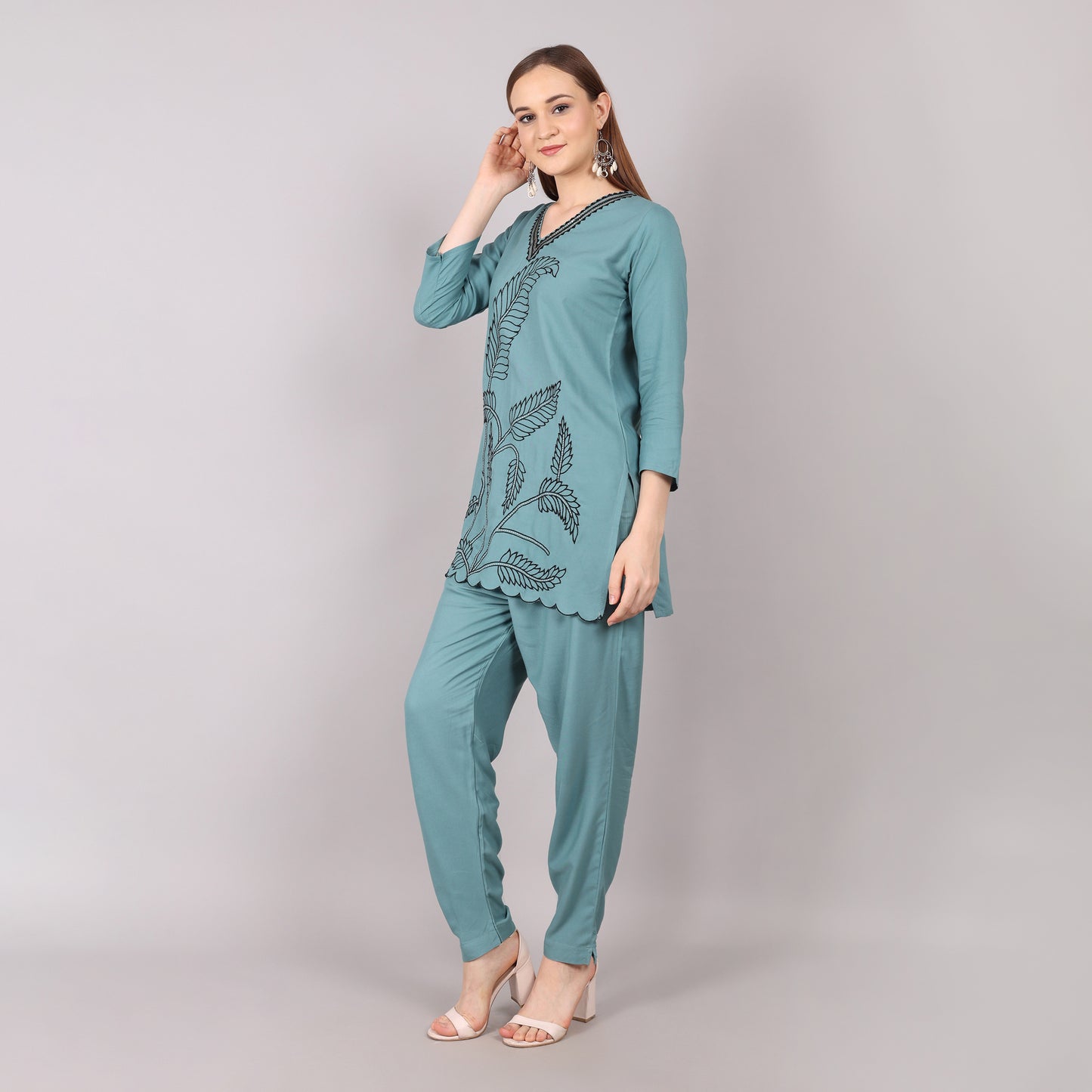 Chic teal co-ord set with delicate embroidery, perfect for festive occasions and party wear.
