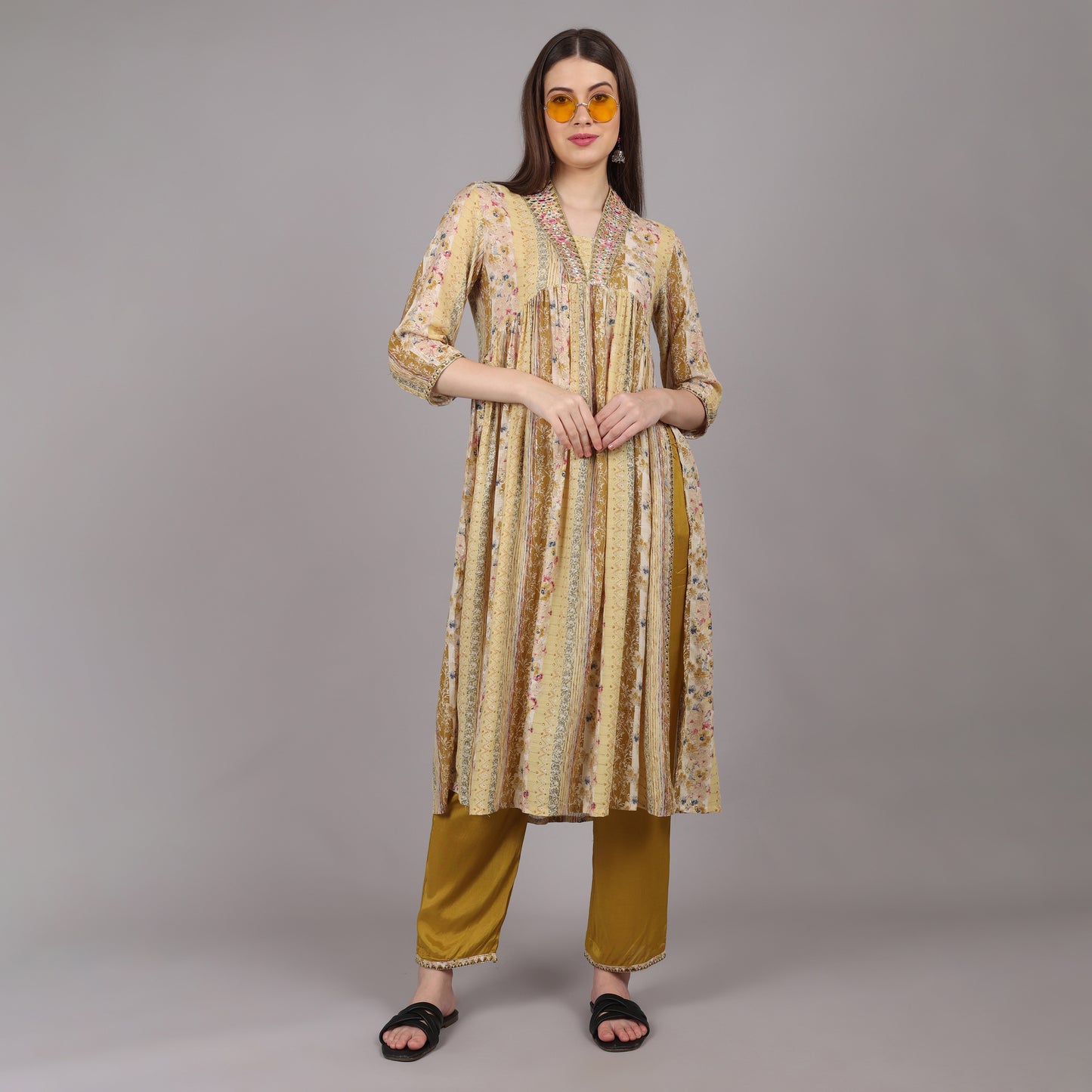 Elegant Nyra cut 2-piece kurta set featuring a modern silhouette with a stylish appeal.
