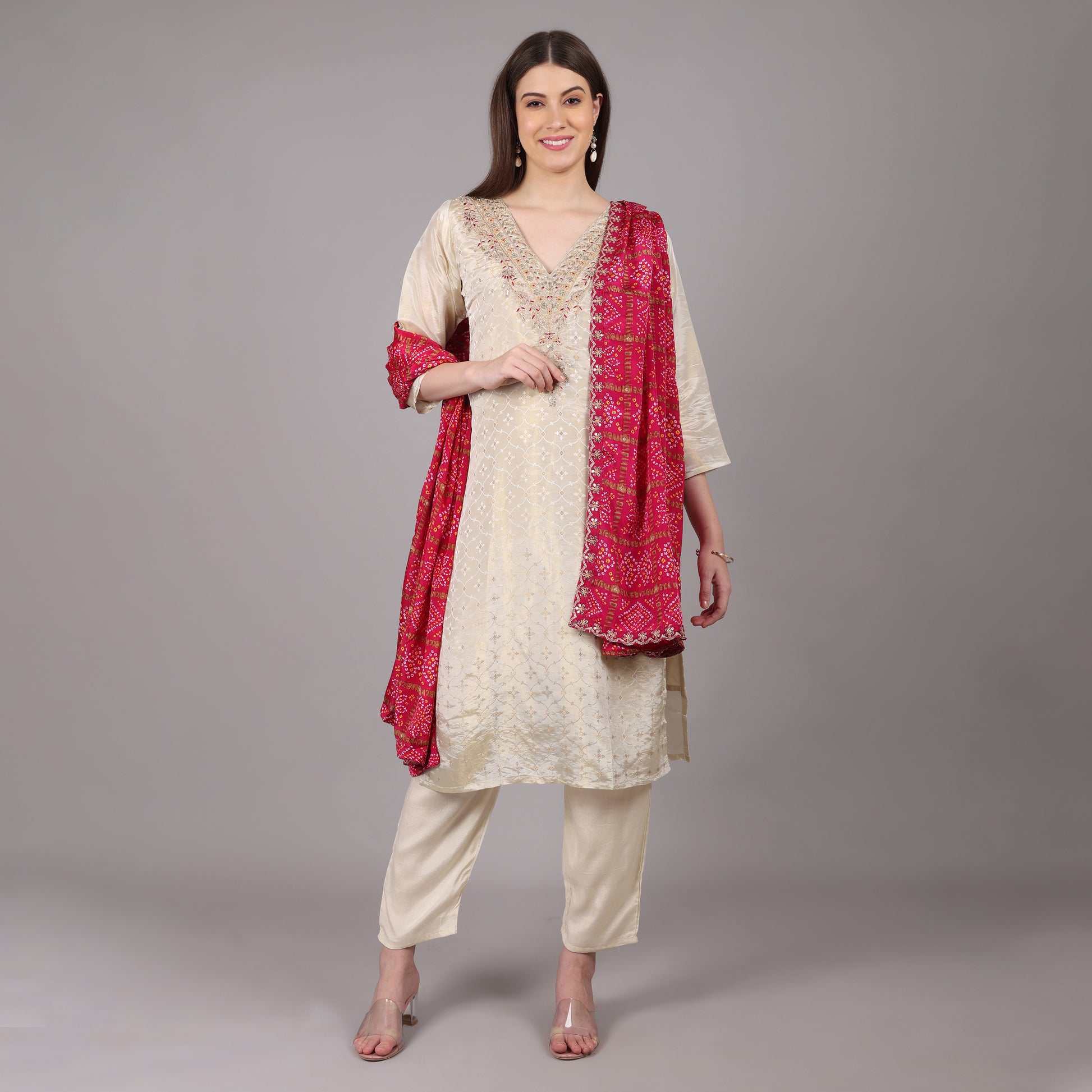 Chic and stylish Jacquard tissue kurta set featuring intricate weaving and a graceful Gatchola dupatta.