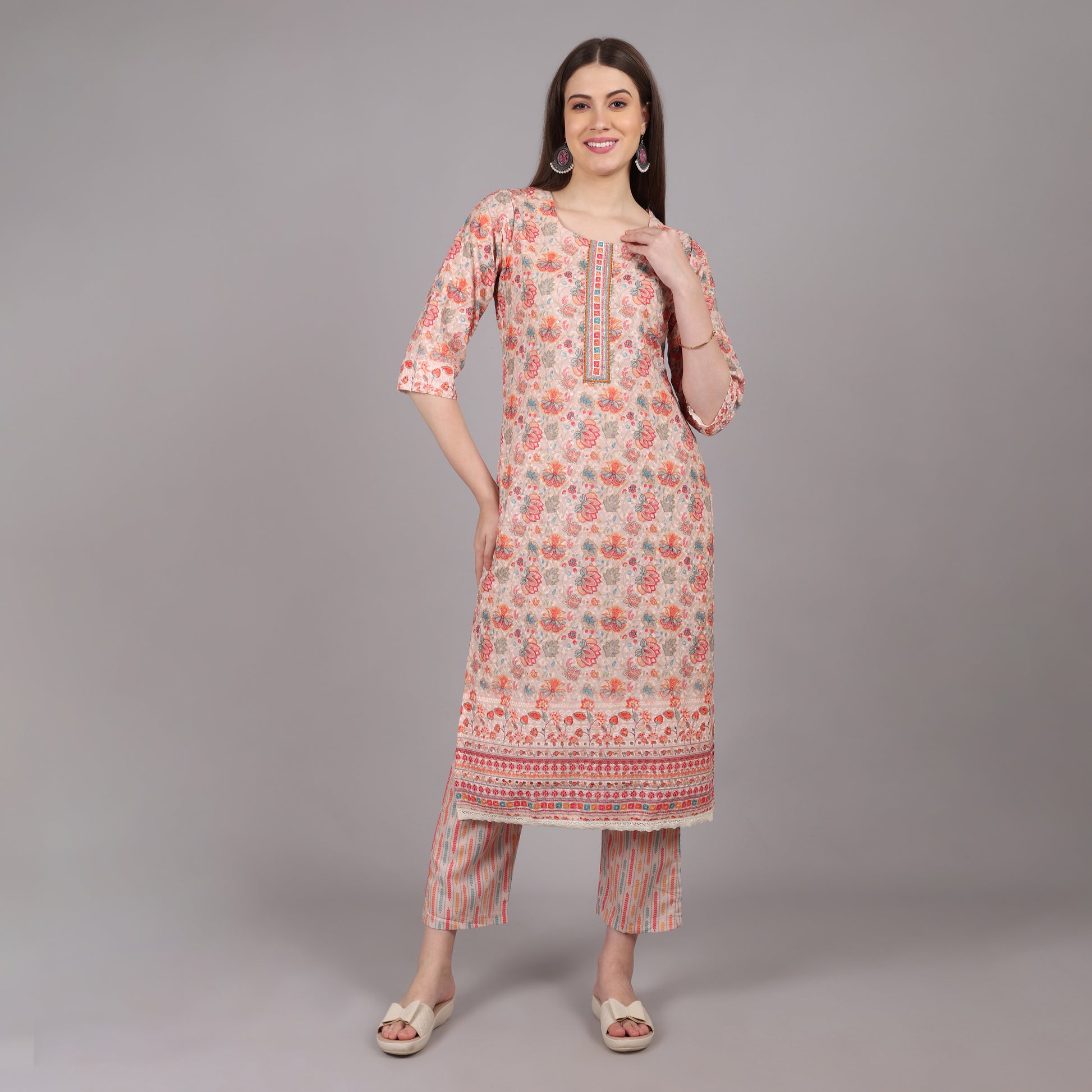 Graceful floral Chikankari kurta set blending traditional craftsmanship with modern elegance.
