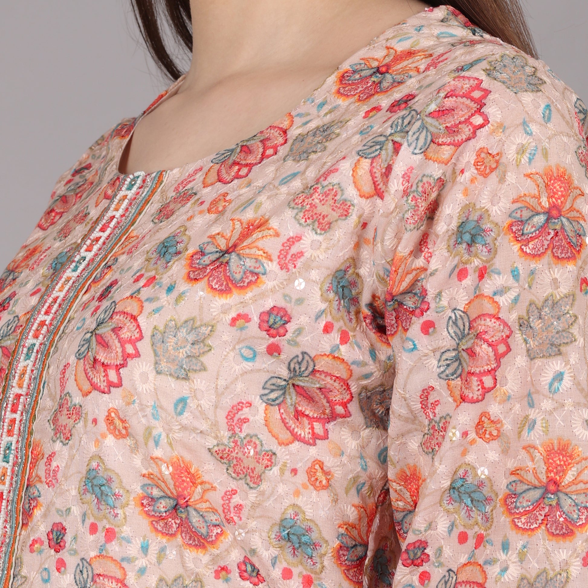 Elegant floral Chikankari kurta set featuring intricate hand embroidery for a timeless ethnic look.
