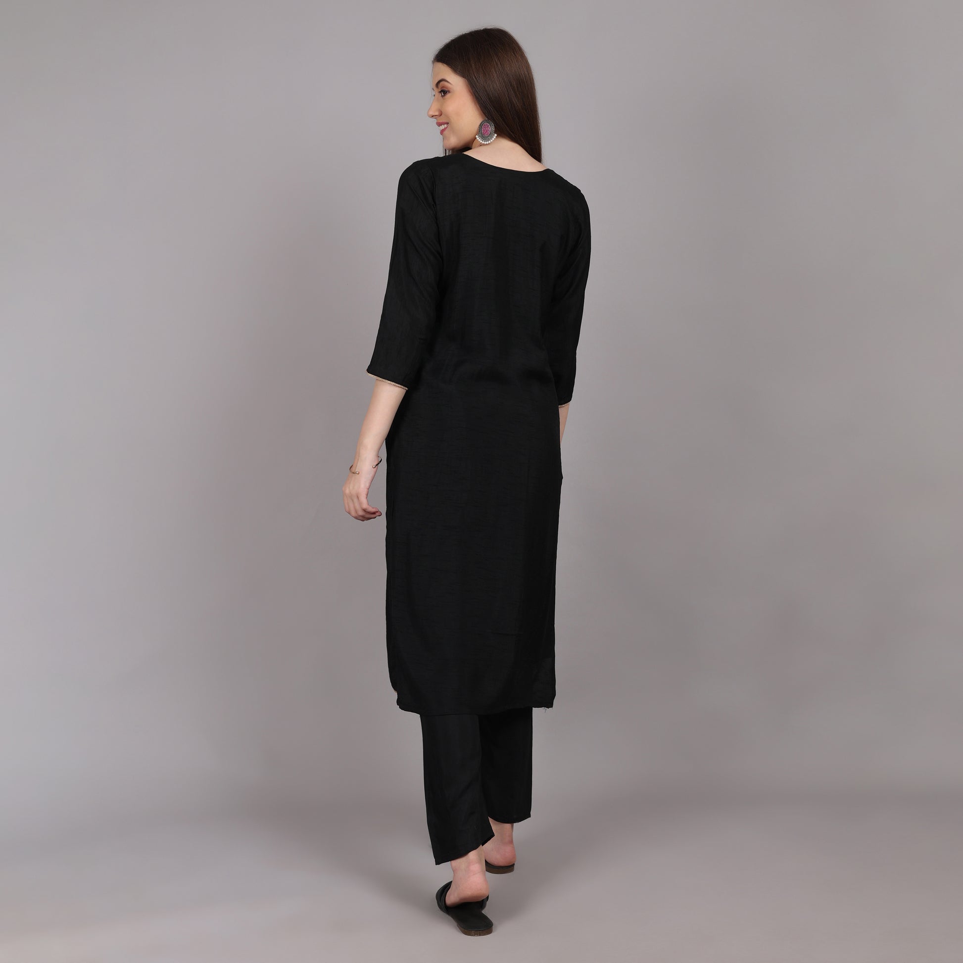Sophisticated black mulberry silk kurta set, designed for effortless grace and grandeur.






