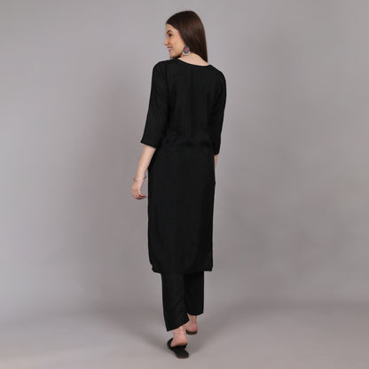 Sophisticated black mulberry silk kurta set, designed for effortless grace and grandeur.






