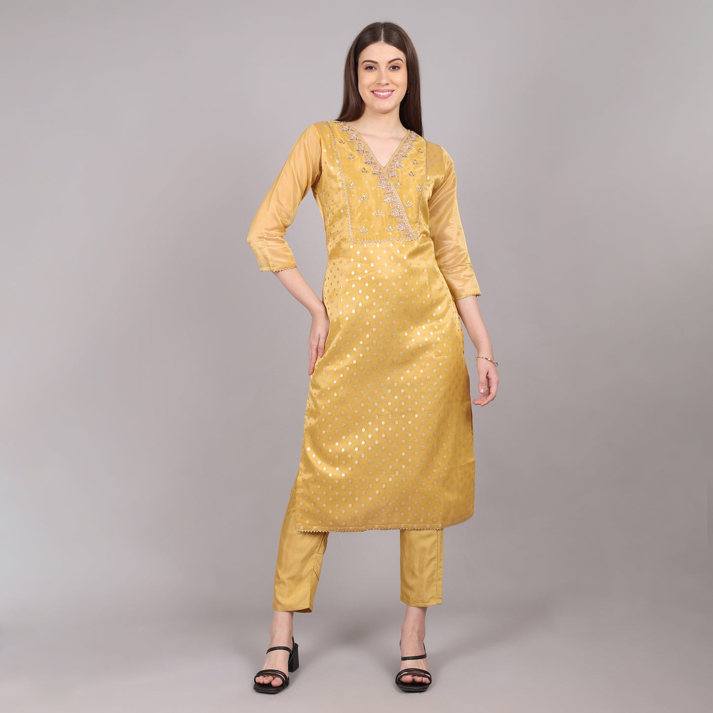 Lightweight and breathable golden pure tissue kurta set, offering comfort with opulent elegance.
