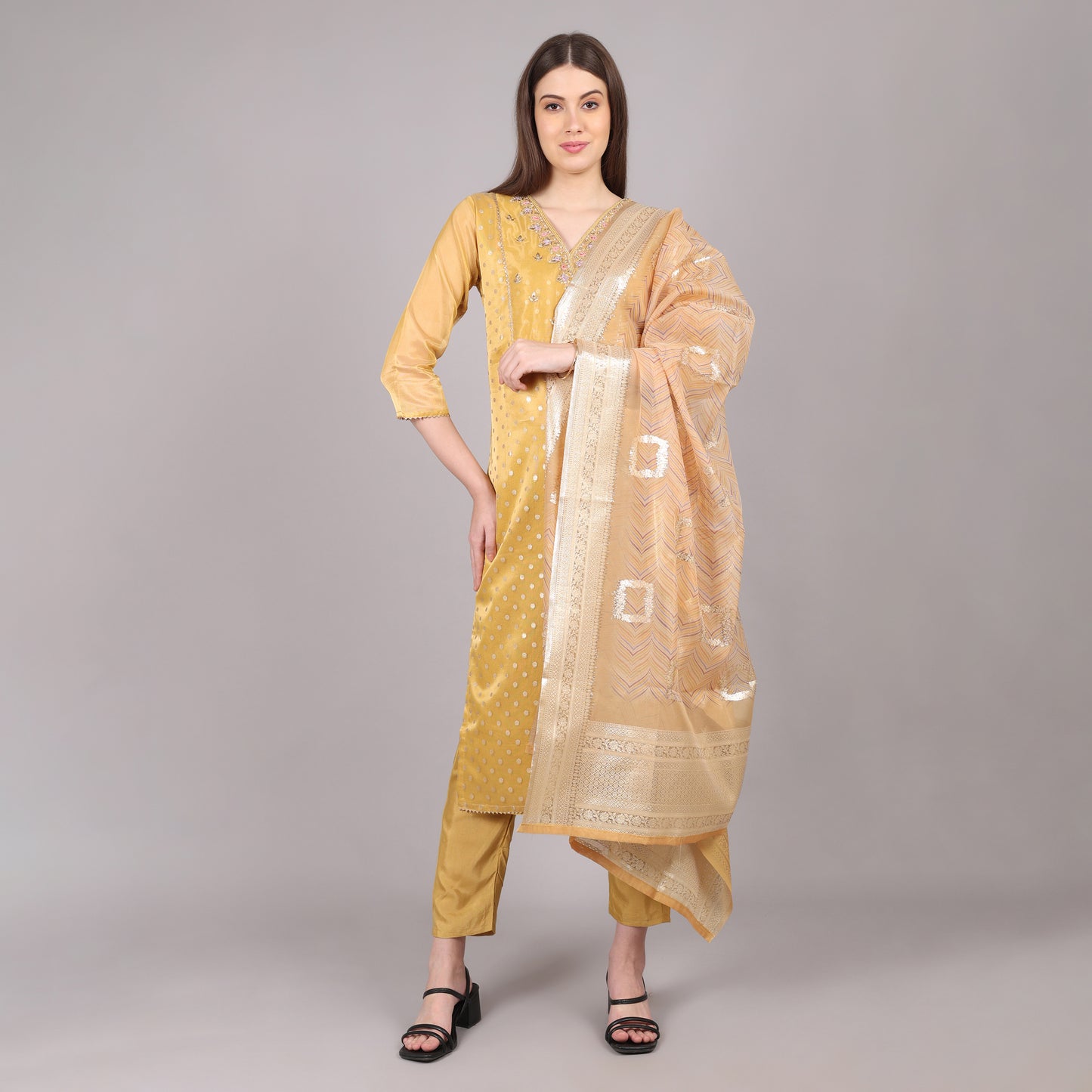 Chic and stylish golden tissue kurta set, perfect for weddings and festive occasions.
