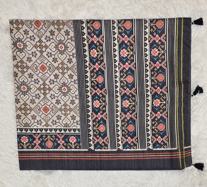 Elegant Cream & Black Tussar Silk Patola Print Saree
