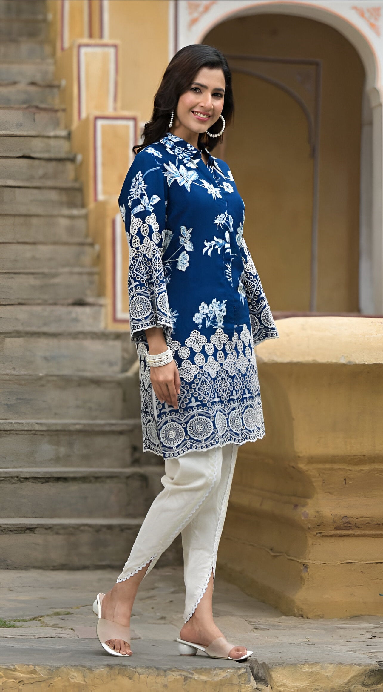 Chic blue shirt kurta and dhoti set with Schiffli work, blending traditional craftsmanship with modern fashion.