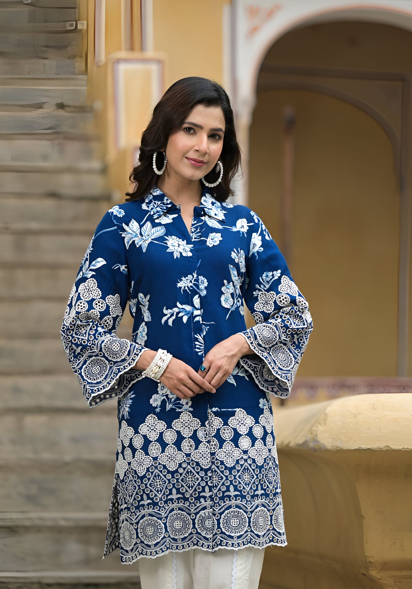 Elegant blue colorblock shirt kurta and dhoti set featuring intricate Schiffli work for a stylish ethnic look.