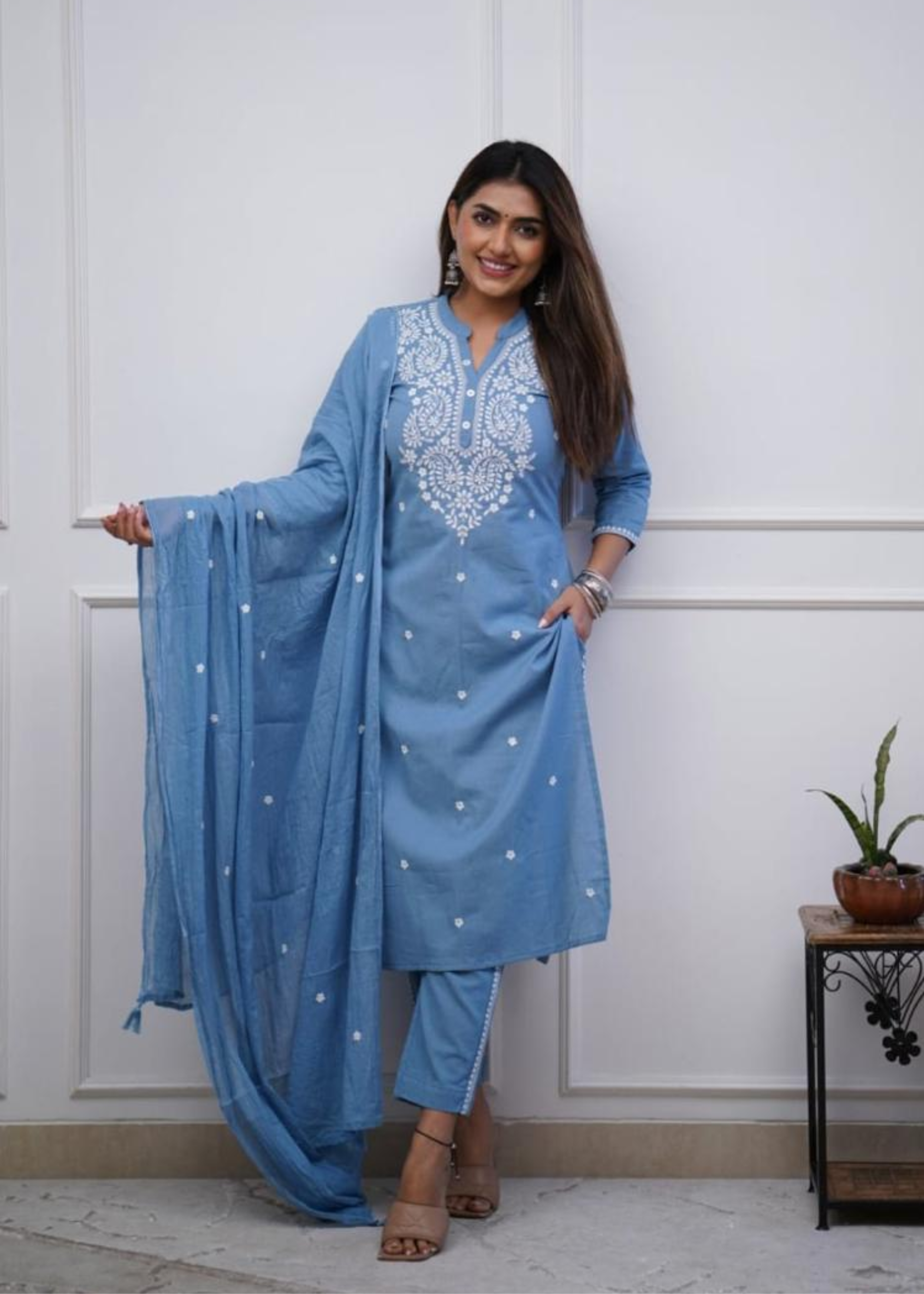 Elegant cotton kurta set with intricate embroidery, designed for all-day comfort and effortless grace.

